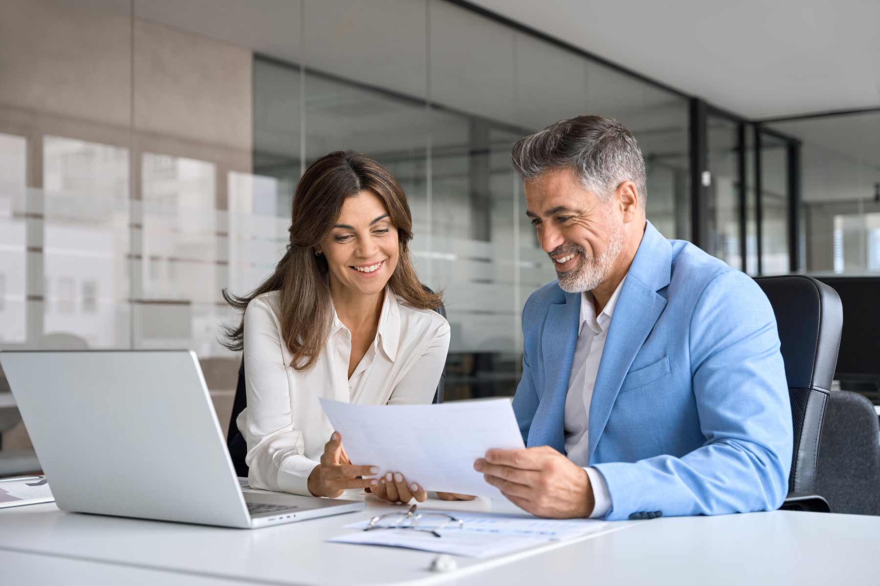 A consultant reviewing a business strategy with a client during a consultation